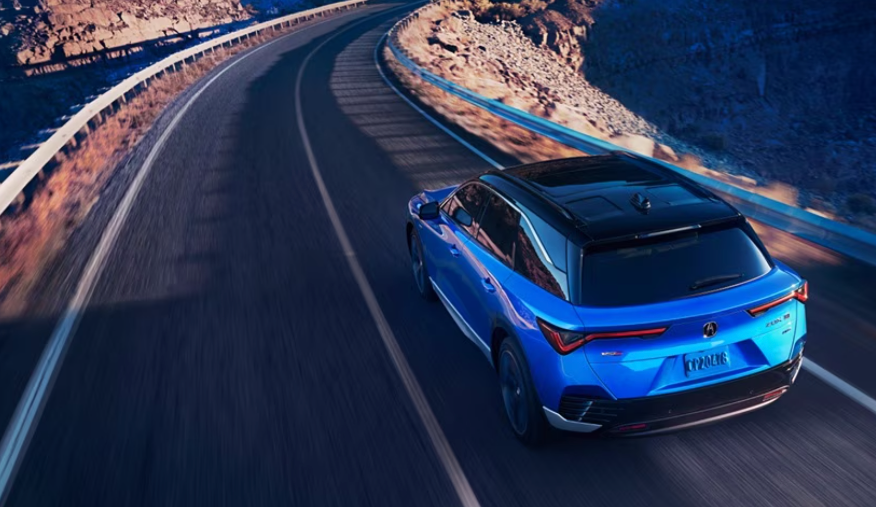 2024 Acura ZDX driving on a highway